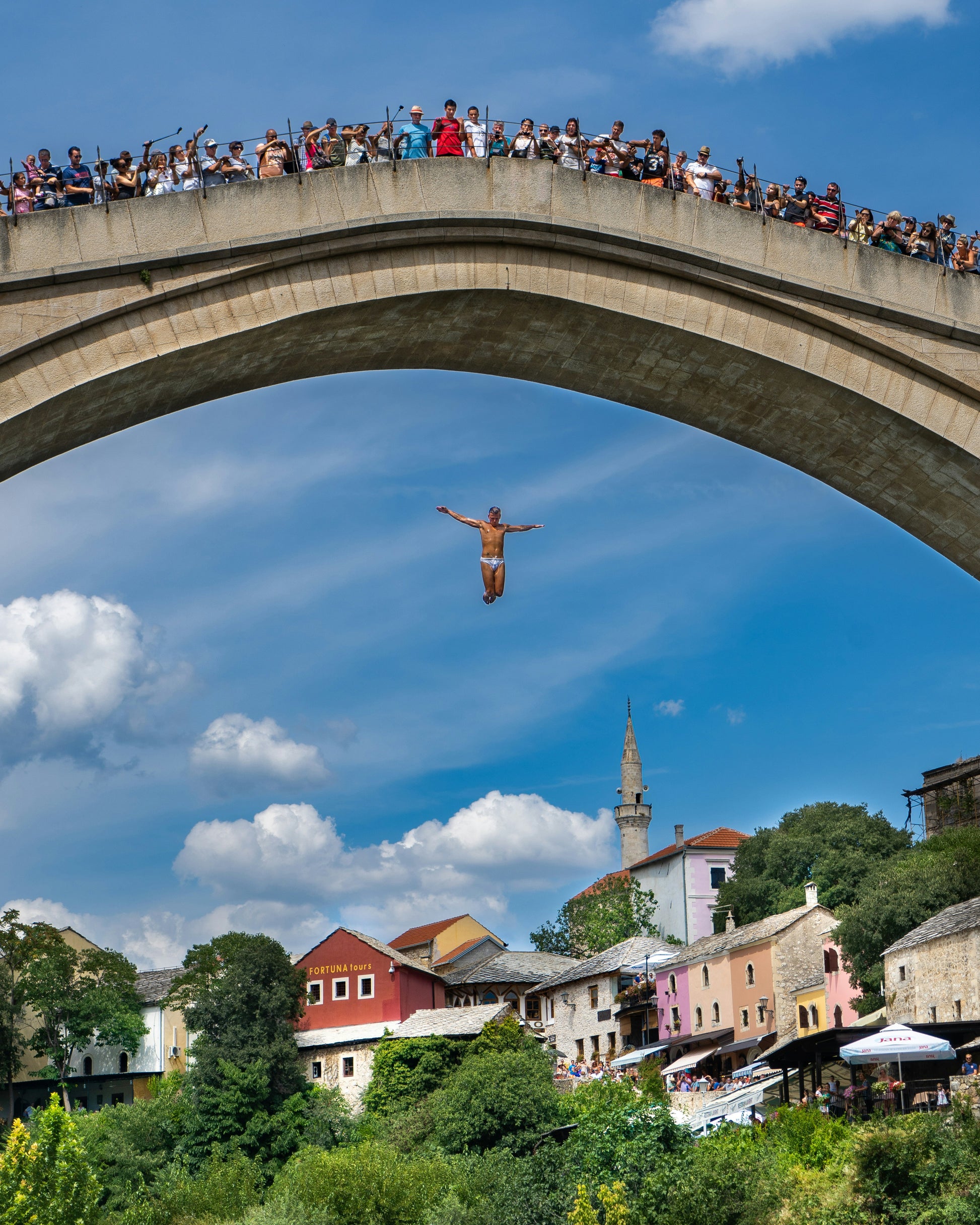 Dive from Stari Most Bridge in Mostar - photo by Darcey Beau