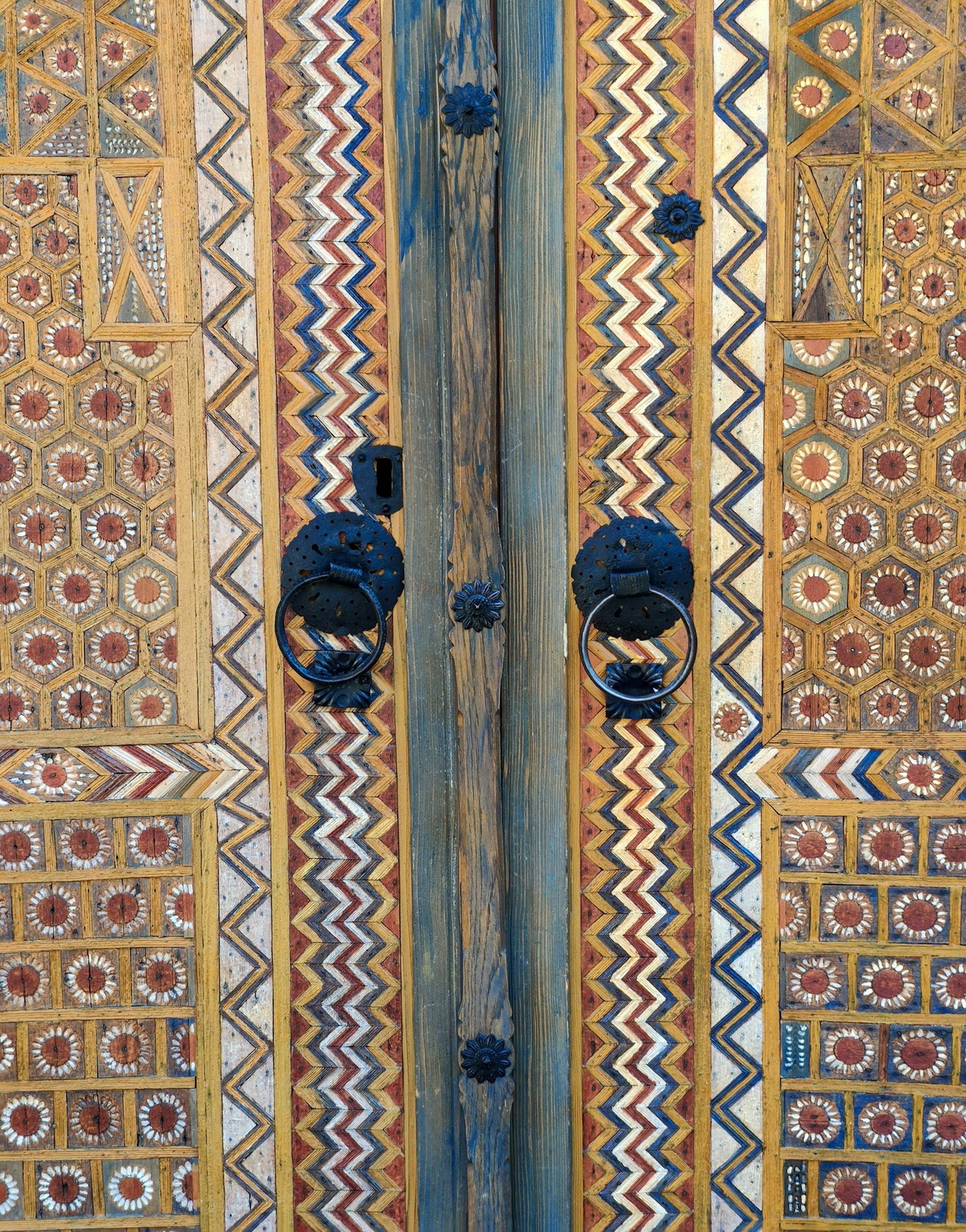 Colourful doors of a mosque in Travnik - Photo by Mujo Hasanović